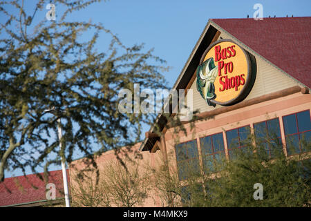 A logo sign outside of a Bass Pro Shops retail store in Mesa, Arizona, on February 4, 2018. Stock Photo