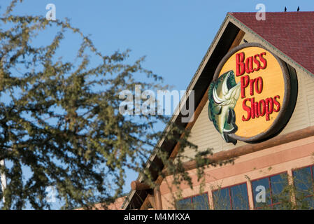 A logo sign outside of a Bass Pro Shops retail store in Mesa, Arizona, on February 4, 2018. Stock Photo