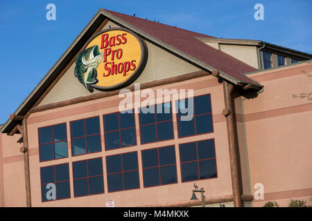 A logo sign outside of a Bass Pro Shops retail store in Mesa, Arizona, on February 4, 2018. Stock Photo