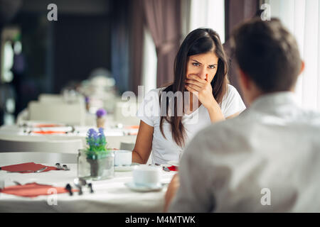 Shocked woman in disbelief.Handling bad news.Relationship,marital problems.Woman hearing confession from husband.Disappointed assaulted emotional fema Stock Photo