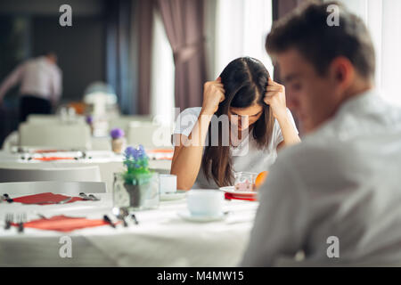 Furious woman having emotional problems.Relationship issues.Breaking up,divorce,having hurtful conversation.Confession,telling truth.Questioning yours Stock Photo