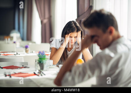 Desperate woman crying.Emotional problems.Relationship issues.Breaking up,divorce,having hurtful conversation.Confession,telling truth.Financial probl Stock Photo