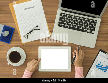 woman working at office desk and using tablet computer.  free space for text. Stock Photo