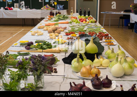 Wide variety of fresh fruit & veg entries displayed on tables, in competition at Gardeners' Show - Burley-in-Wharfedale, West Yorkshire, England, UK. Stock Photo