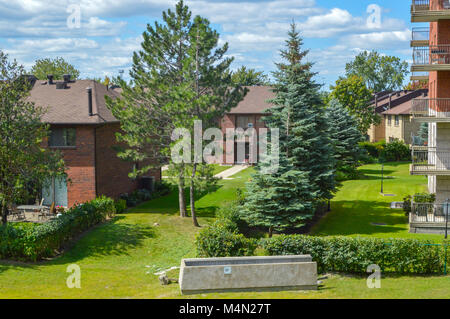 Modern condo buildings and houses with huge windows and balconies in Montreal, Canada. Stock Photo