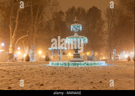 Zrinjevac park Fountain decorated by Christmas lights as part of Advent in Zagreb. Stock Photo