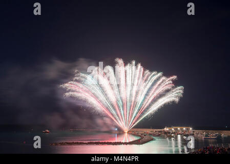 Firework display on the Cobb during the  bonfire night celebrations on 4th November 2017. Stock Photo