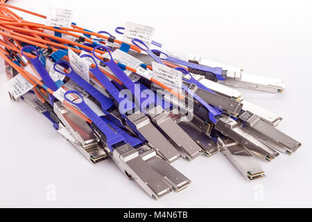 Bunch of Fiber optics cables, isolated on white background. Stock Photo
