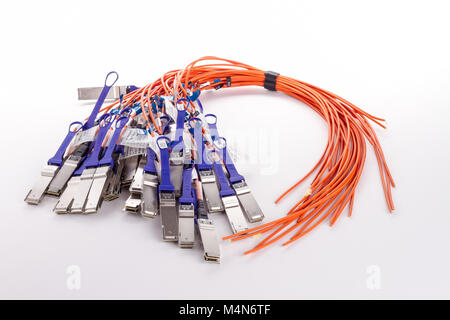 Bunch of Fiber optics cables, isolated on white background. Stock Photo