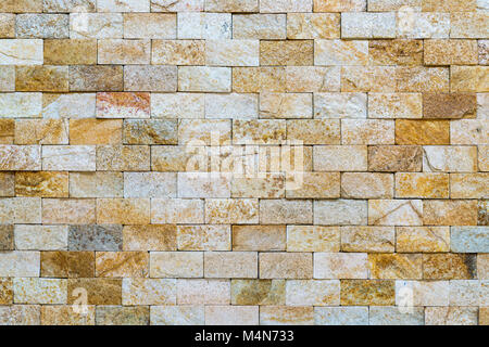 Decorative stone for decoration of the fireplace. Background. Stock Photo