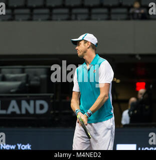 New York, USA. 16th Feb, 2018. Sam Querrey of USA reacts during quarterfinal match against Ivo Karlovic of Croatia at ATP 250 New York Open tournament at Nassau Coliseum Credit: lev radin/Alamy Live News Stock Photo