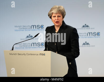 Munich, Germany. 17th Feb, 2018. British Prime Minister Theresa May addresses the Munich Security Conference (MSC) in Munich, Germany, on Feb. 17, 2018. Theresa May here on Saturday called for talks with European Union (EU) about a new security treaty after London left the bloc. Credit: Luo Huanhuan/Xinhua/Alamy Live News Stock Photo