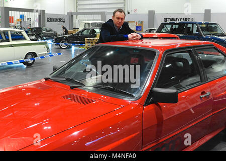 London, UK. 17th Feb, 2018. TV star Philip Glenister (English actor) at a photocall at the London Classic Car Show which is taking place at ExCel London, United Kingdom.  The car that he's leaning on is a 1980's Audi Quattro. Glenister, (best known for his role as the Mancunian police officer, DCI Gene Hunt) drove one in the BBC series 'Life on Mars' and 'Ashes to Ashes' and famously used the line 'Fire up the Quattro!'   Credit: Michael Preston/Alamy Live News Stock Photo