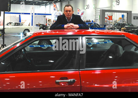 London, UK. 17th Feb, 2018. TV star Philip Glenister (English actor) at a photocall at the London Classic Car Show which is taking place at ExCel London, United Kingdom.  The car that he's leaning on is a 1980's Audi Quattro. Glenister, (best known for his role as the Mancunian police officer, DCI Gene Hunt) drove one in the BBC series 'Life on Mars' and 'Ashes to Ashes' and famously used the line 'Fire up the Quattro!'   Credit: Michael Preston/Alamy Live News Stock Photo