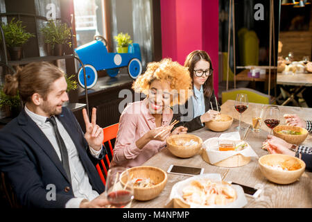 Business people during the dinner in the restaurant Stock Photo