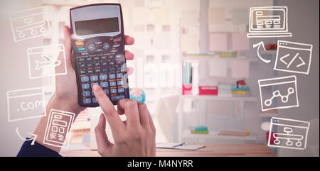 Composite image of hands of businesswoman using calculator Stock Photo