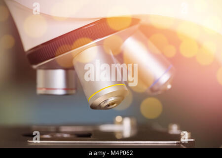 Close up on microscope in laboratory Stock Photo