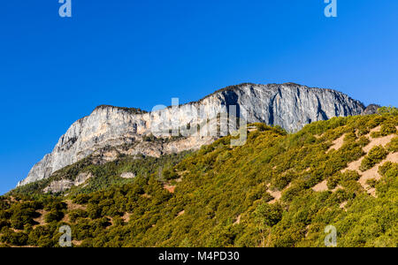 One of the mountain tops overlooking Lugu Lake at Yunnan, China. It was a massive rock. Stock Photo