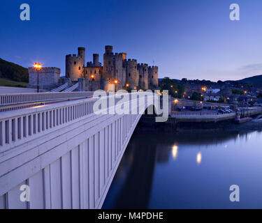 Conway castle and road bridge at dusk, North Wales Stock Photo
