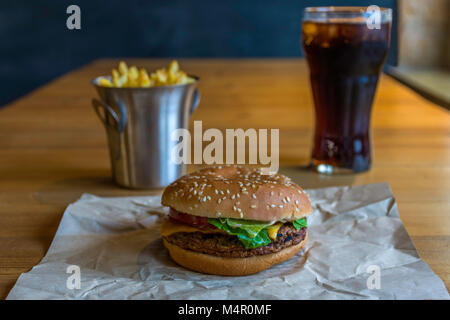 Fast food set big hamburger, french fries and drink. Stock Photo
