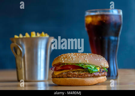 Fast food set big hamburger, french fries and drink. Stock Photo