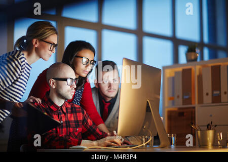 Designers working late Stock Photo