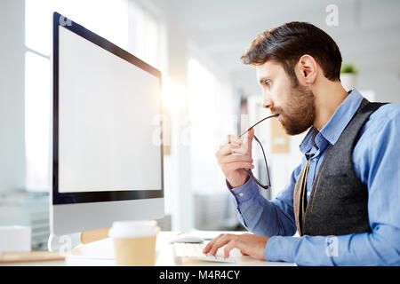 Serious office worker Stock Photo