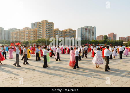 Pyongyang, North Korea - July 27, 2014: Mass dances of Korean students in honor of the victory in the Patriotic War of Liberation. Stock Photo