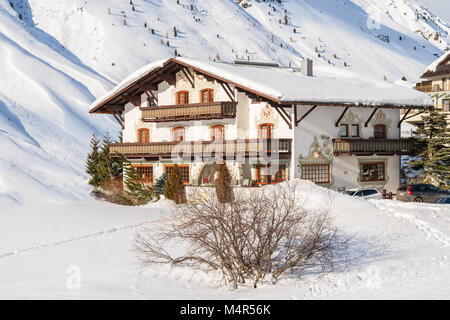HOCHGURGL VILLAGE, AUSTRIA - JAN 28, 2018: Mountain house in beautiful Obergurgl-Hochgurgl ski area, Tirol, Austria. Stock Photo