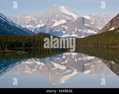Mount Gould with Angel Wing in the foreground, over Swiftcurrent Lake Stock Photo