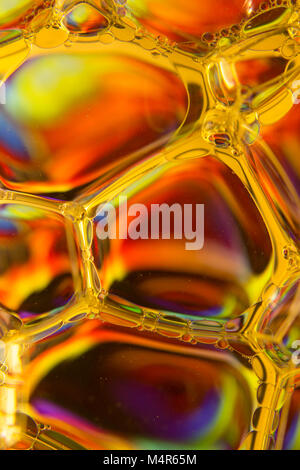 Colorful vibrant psychedelic abstract background and texture of bubbles, oil and water Stock Photo