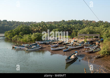 Park, traditional fishing boats on a pier in the river Stock Photo