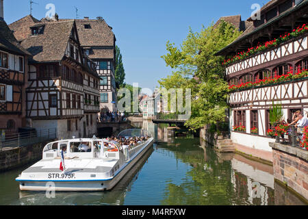 Excursion boat on Ill river passing Maison des Tanneurs at La Petite France (Little France), Strasbourg, Alsace, Bas-Rhin, France, Europe Stock Photo