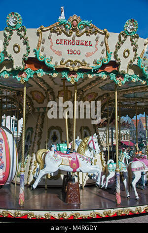 Old historical children's merry-go-round at Haguenau, Alsace, France, Europe Stock Photo
