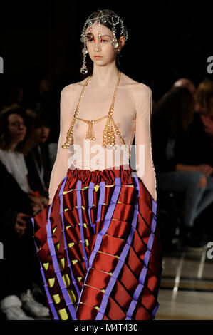 Model on the catwalk at the Susan Fang fashion show at Fashion Scout AW18 at Freemasons Hall, Covent Garden, London, UK. Fashion Scout takes place during London Fashion Week. Susan graduated from Central St. Martins in 2015. 17th February 2018. Credit: Antony Nettle/Alamy Live News Stock Photo