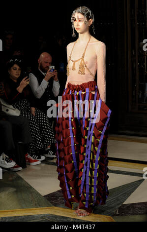 Model on the catwalk at the Susan Fang fashion show at Fashion Scout AW18 at Freemasons Hall, Covent Garden, London, UK. Fashion Scout takes place during London Fashion Week. Susan graduated from Central St. Martins in 2015. 17th February 2018. Credit: Antony Nettle/Alamy Live News Stock Photo