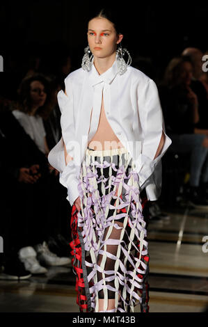 Model on the catwalk at the Susan Fang fashion show at Fashion Scout AW18 at Freemasons Hall, Covent Garden, London, UK. Fashion Scout takes place during London Fashion Week. Susan graduated from Central St. Martins in 2015. 17th February 2018. Credit: Antony Nettle/Alamy Live News Stock Photo