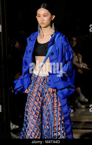 Model on the catwalk at the Susan Fang fashion show at Fashion Scout AW18 at Freemasons Hall, Covent Garden, London, UK. Fashion Scout takes place during London Fashion Week. Susan graduated from Central St. Martins in 2015. 17th February 2018. Credit: Antony Nettle/Alamy Live News Stock Photo