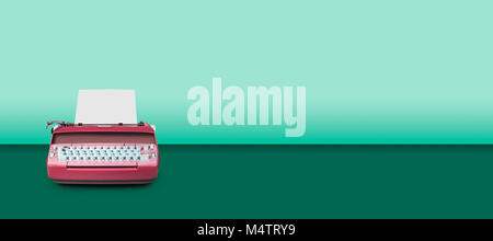 Old electric typewriter  on green table background Stock Photo