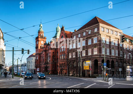 Berlin,Pankow, Rathaus. Historic old red brick Town hall. Building exterior & facade  with clock tower & turrets.  The city hall Pankow is the seat of Stock Photo