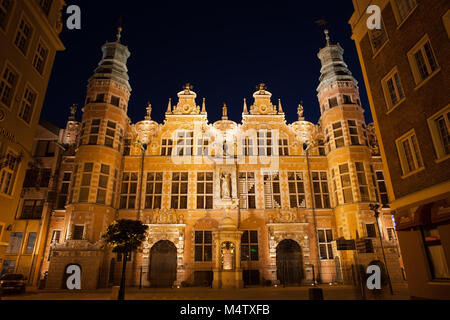 The Great Armoury - Grand Armoury (Wielka Zbrojownia) illuminated at night in city of Gdansk, Poland, Europe, Netherlandic Mannerism late Renaissance  Stock Photo