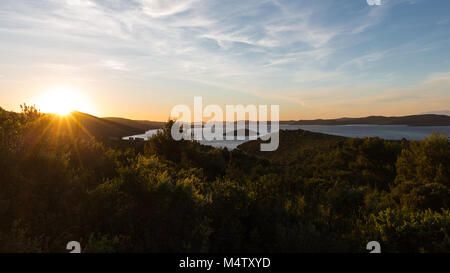 Sunset at the forested coast of Dugi Otok, Croatia