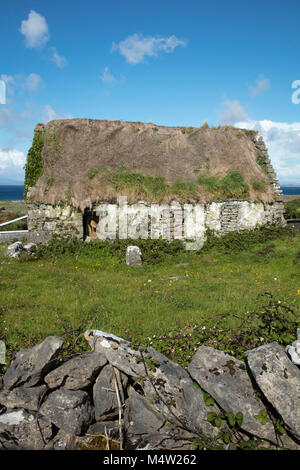 Old ruined thatch cottage on Inishmore, Aran Islands, County Galway, Ireland. Stock Photo