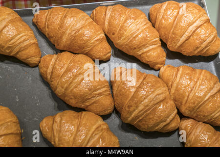 Croissants on a black background from above Stock Photo