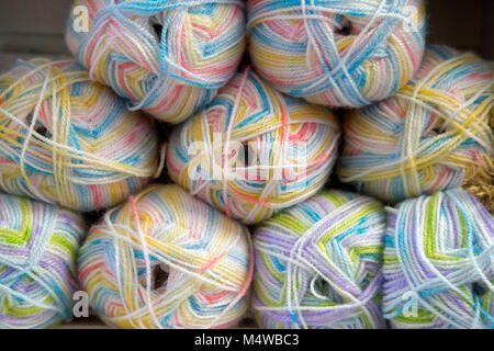 A pile of multi coloured knitting yarn Stock Photo