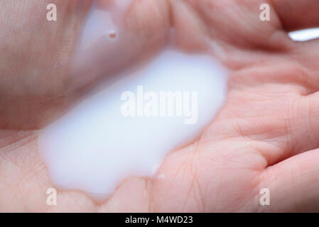 Man hand with liquid soap on hands Stock Photo