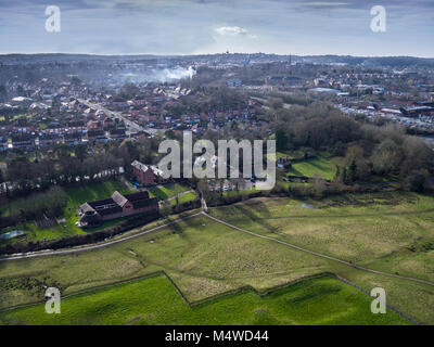 An aerial view of the Worcestershire town of Redditch showing Bordesley Abbey Meadows in the foreground with the town centre behind. Stock Photo