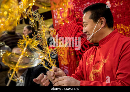 Chinese master Jin Wenchang makes figurines of hot liquid caramel as part of chinese 'caramel' folk art Stock Photo