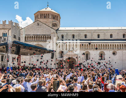 the graduation ceremony in the main square of the city of Trento, italy. The city is famous for the prestigious universities. Stock Photo