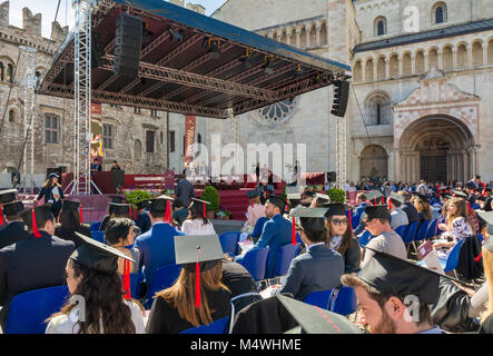 the graduation ceremony in the main square of the city of Trento. The city is famous for the prestigious universities. Stock Photo